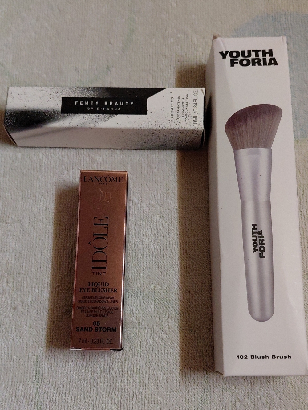 Lancome Liquid Eye-Blusher, Fenty Beauty Eye Brightener, Youth Foria Blush Brush